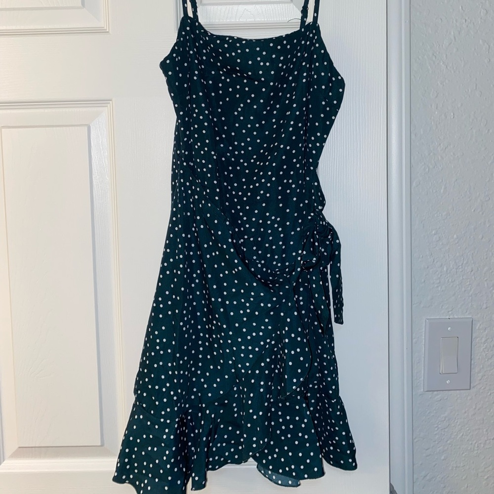 Princess Polly dark green polka dot dress with side bow